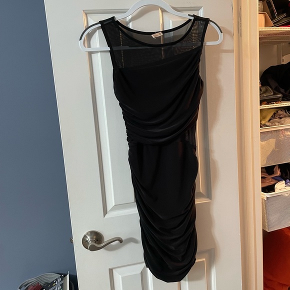 Tight black ruffled dress with mesh detail - Picture 5 of 6